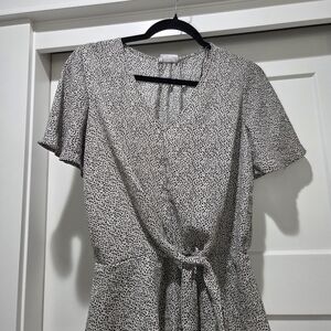 Elegant Black and White Wrap Blouse